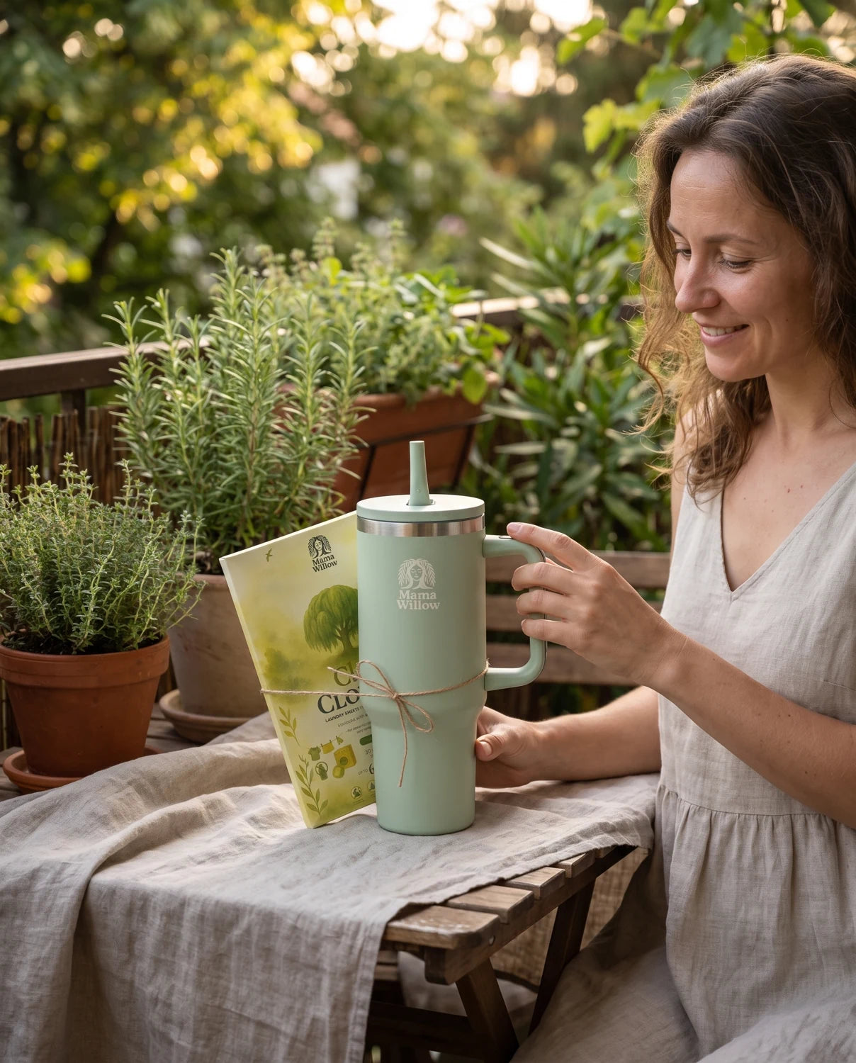 Lena with Lieblingsmoment and MamaWillow laundry sheets in the garden — AI-generated scene